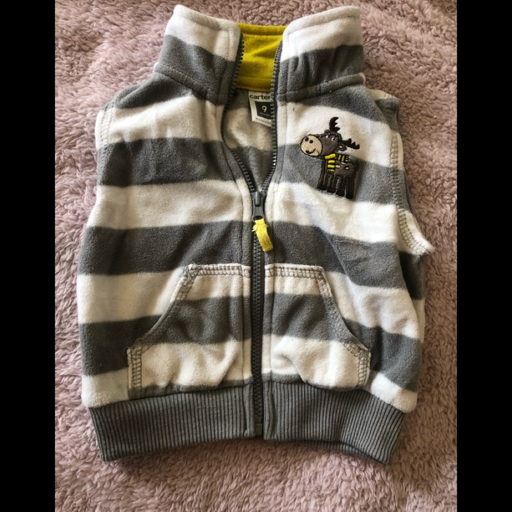 Adorable grey and white striped fleece vest.